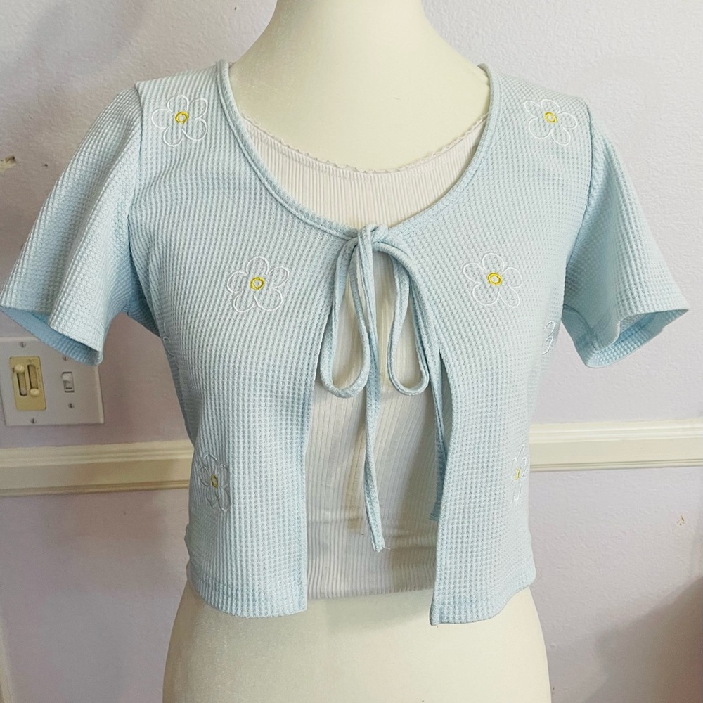 Blue tie top with embroidered flowers